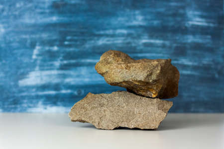 Stylish background for advertising products with stones. Stylish appearance, layout, personality. Banner, a place for the text. Background for advertising and presentation.の写真素材