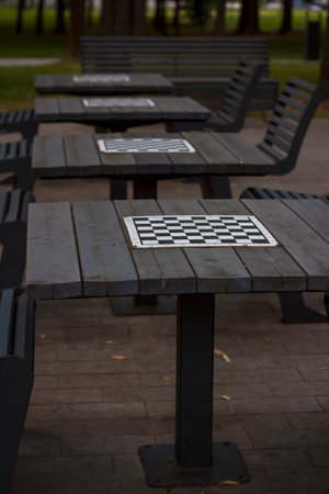 There are chess tables for everyone in the park. city playgroundsの写真素材
