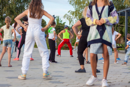 2022-08-17. Russia. Samara. Zumba dancing classes in the open air. Fitness, sports, victory, success and the concept of a healthy lifestyle. Everyone can do sports outdoorsのeditorial素材
