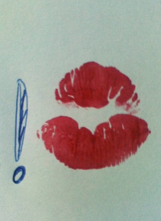 Red kiss on a paperの写真素材