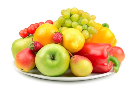 fruits and vegetables on a plate isolated on white background                         の写真素材