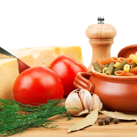 vegetables, pasta, spices and kitchen utensilsの写真素材