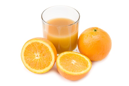 oranges and orange juice isolated on white backgroundの写真素材