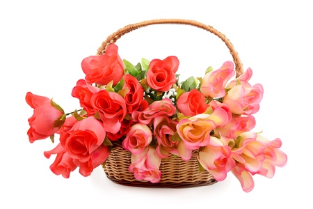 basket with colorful artificial flowersの写真素材