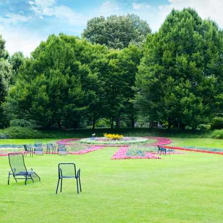 Lounge chairs for relaxing in the summer parkの写真素材