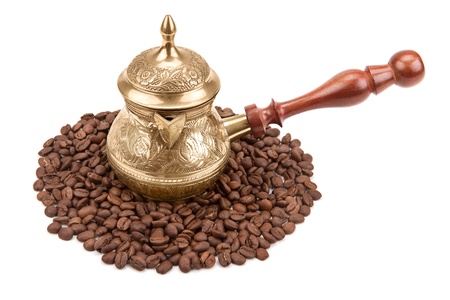 coffee pot and coffee beans isolated on white backgroundの写真素材