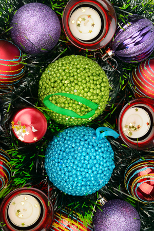 background of Christmas decorations and candlesの写真素材