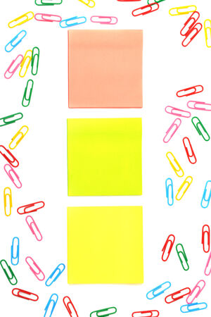 stickers and a set of paper clips isolated on white backgroundの写真素材