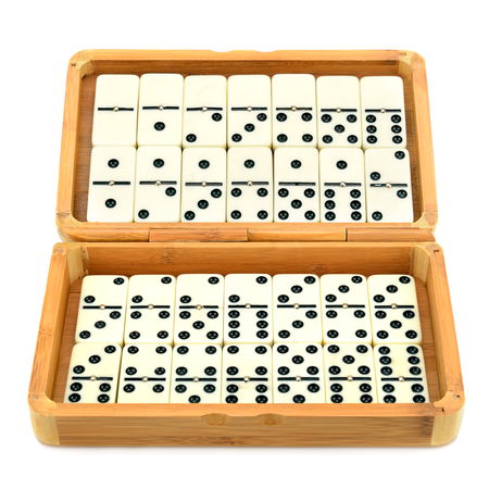 domino in box isolated on white backgroundの写真素材