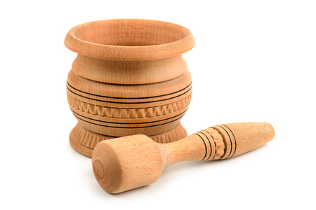 wooden pestle and mortar isolated on white backgroundの写真素材