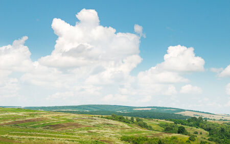 picturesque hills against the blue skyの写真素材