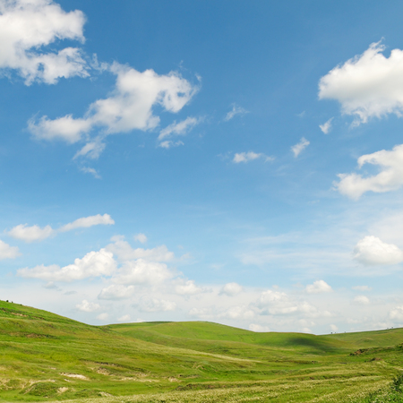 picturesque hills against the blue skyの写真素材