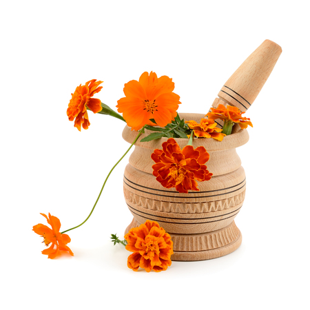 wooden pestle and mortar isolated on white backgroundの写真素材