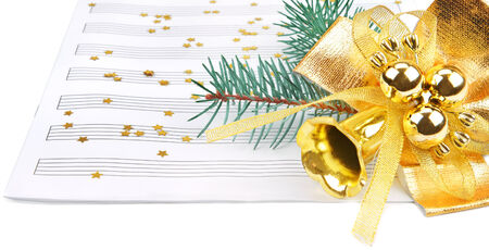 Christmas decorations and music sheet isolated on white backgroundの写真素材