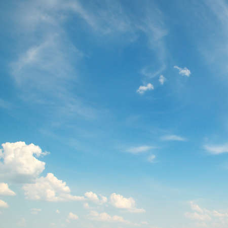 white clouds on a blue sky backgroundの写真素材
