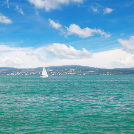 seascape with turquoise waters and sailing vesselの写真素材