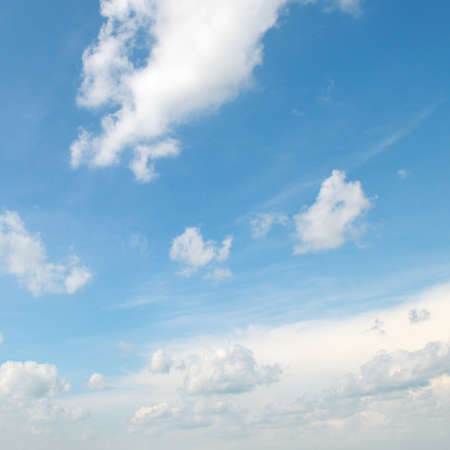 white clouds on a blue sky の写真素材