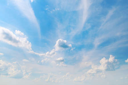 white clouds on a blue sky backgroundの写真素材