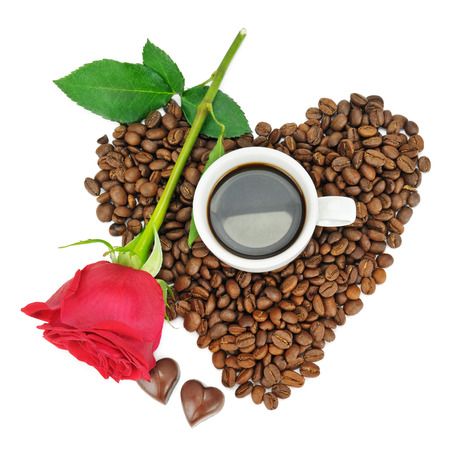 coffee beans, cup and rose isolated on white backgroundの写真素材