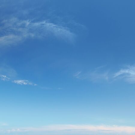plumose clouds in the blue skyの写真素材