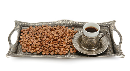 cup and coffee grain isolated on white backgroundの写真素材