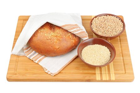 bread and wheat isolated on white backgroundの写真素材