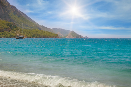 seascape, blue sky and mountainous coastの写真素材