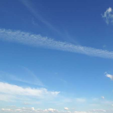 light clouds in the blue sky