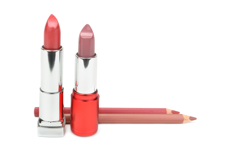 lipsticks and cosmetic pencils isolated on a white backgroundの写真素材