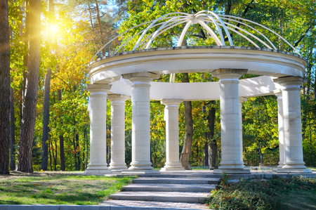 beautiful gazebo in autumn parkの写真素材