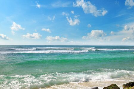 ocean, picturesque beach and blue skyの写真素材