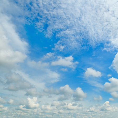 blue sky and white cumulus cloudsの写真素材