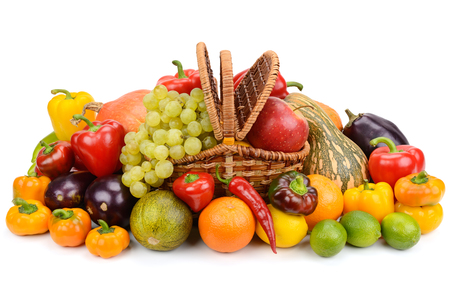 vegetables and fruits in a basket isolated on white backgroundの写真素材