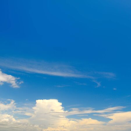 blue sky and white cumulus cloudsの写真素材