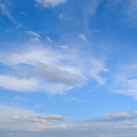 blue sky and white cumulus cloudsの写真素材