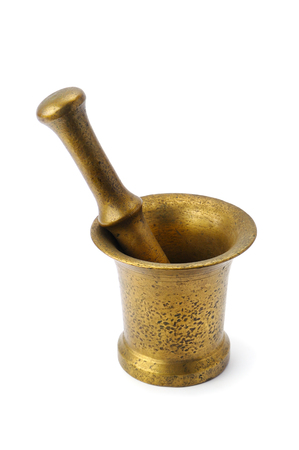 metal mortar and pestle isolated on whiteの写真素材