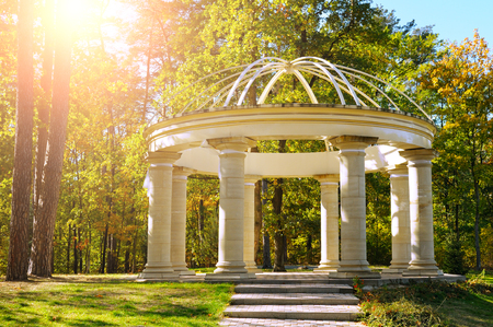 beautiful gazebo in autumn parkの写真素材