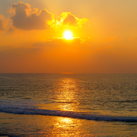Fantastic sunrise on the oceanの写真素材