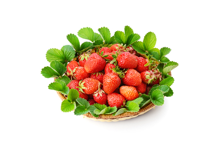 strawberries in a basket isolated on white backgroundの写真素材