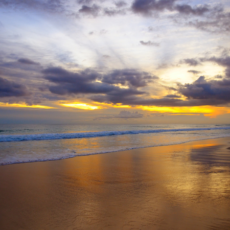 Fantastic sun set over the oceanの写真素材