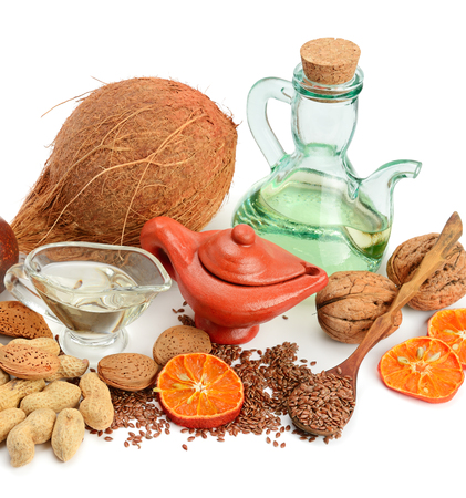 Set of seeds, nuts and vegetable oils, isolated on white backgroundの写真素材