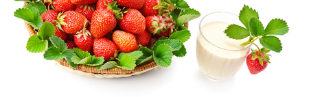 strawberries in a basket and berry smoothies isolated on white backgroundの写真素材