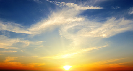 Beautiful sunrise on a blue skyの写真素材
