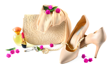 Ladies bag, shoes, jewelry, cosmetics and perfumes isolated on white background. Elegant set of accessory for womenの写真素材