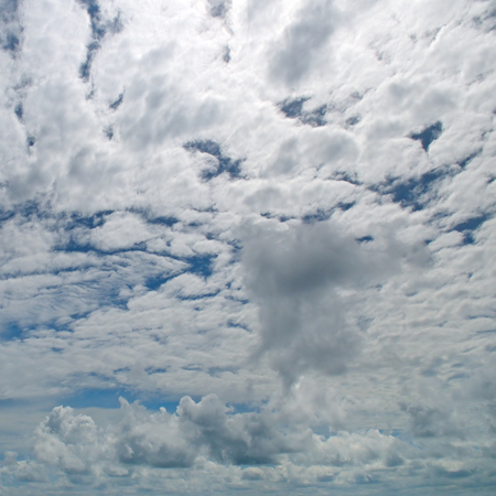 Beautiful dark clouds slowly flying in the sky.の写真素材