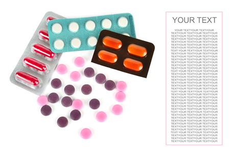 Assorted pharmaceutical medicine pills, tablets and capsules isolated on white background. Flat lay, top view. Free space for text.の写真素材