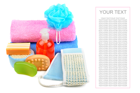 Cotton towels, cosmetic soap, sponge and shampoo isolated on white background. Free space for text.の写真素材