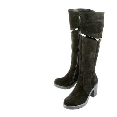 Ladies boots isolated on white background. Comfortable modern shoes. Free space for text.の写真素材
