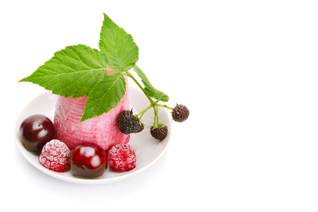 Fruit ice cream and frozen berries isolated on white background. Free space for text.の写真素材