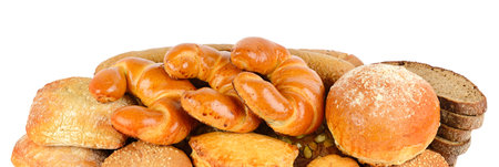 Cereal bread, croissants and sweet pastries in an assortment isolated on white background. Wide...